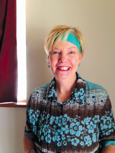 Gail Cresswell waring a headband made for her by a student from the Mowanjum Community. 