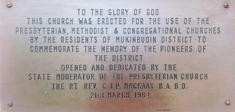 The plaque unveiled on 21 March, 1964. 