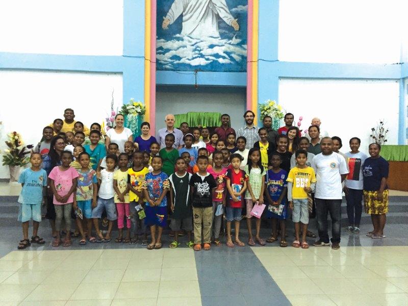 Members of the Uniting Church WA with the youth group at Martin Luther Church in Sentani.