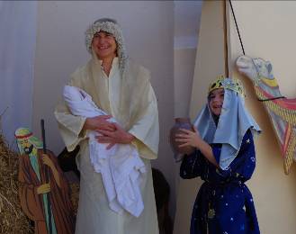 Colette and Jason Pattison test the nativity photo booth. 