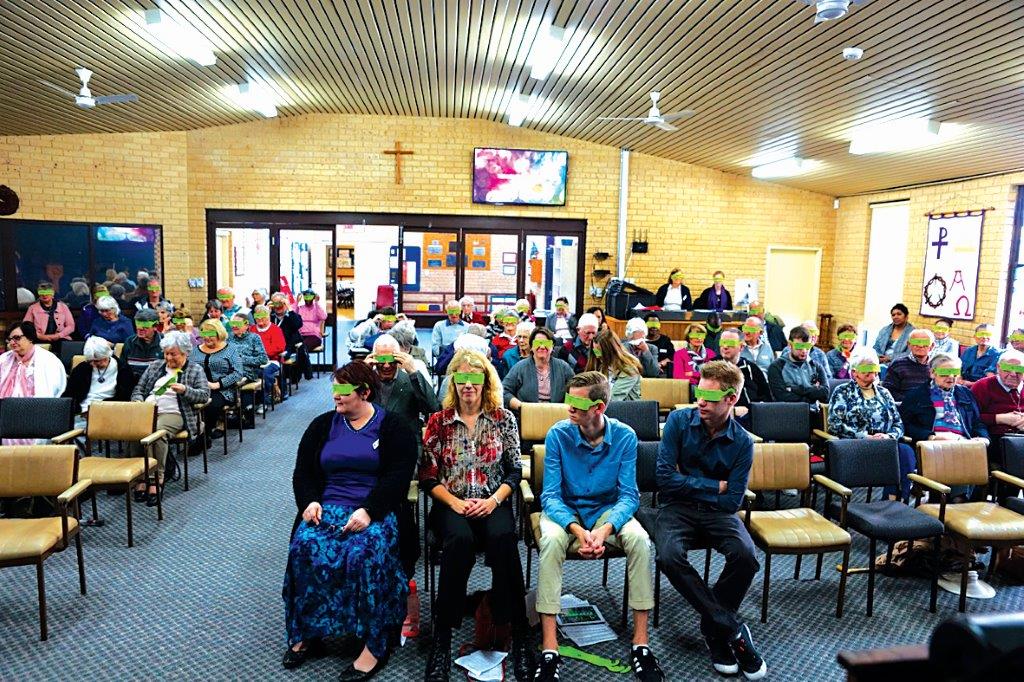 Rockingham Uniting Church wearing their cardboard glasses. 